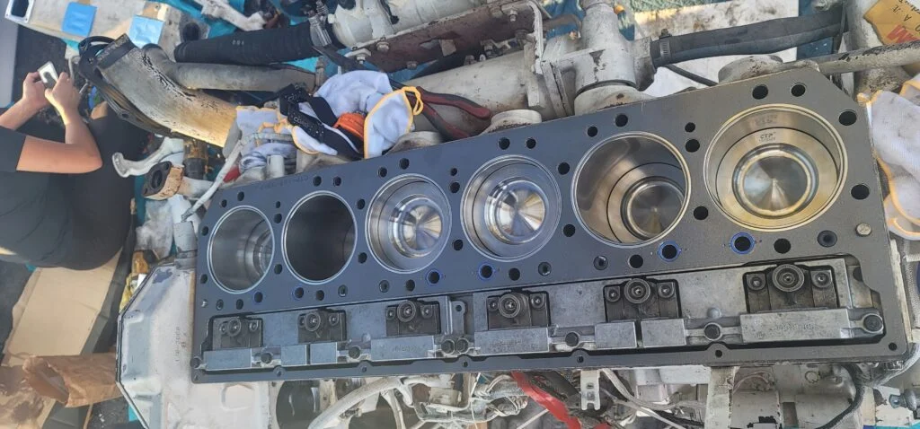 Mobile marine mechanic performing on-site yacht engine repair